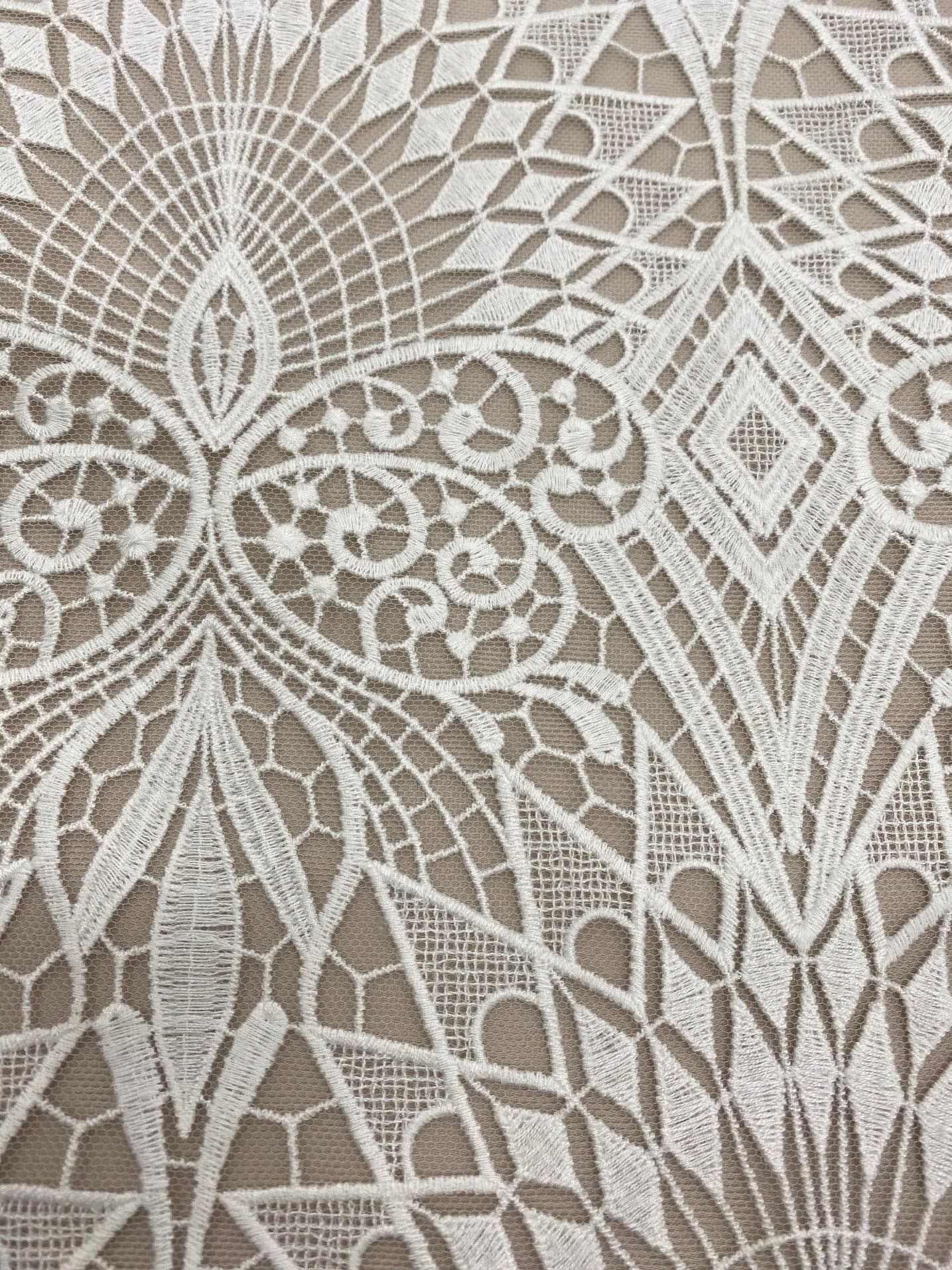 Ivory Embroidered Ornamental Tulle — featuring art deco motifs, 60% nylon 40% polyester, 130cm wide