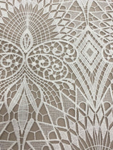 Ivory Embroidered Ornamental Tulle — featuring art deco motifs, 60% nylon 40% polyester, 130cm wide