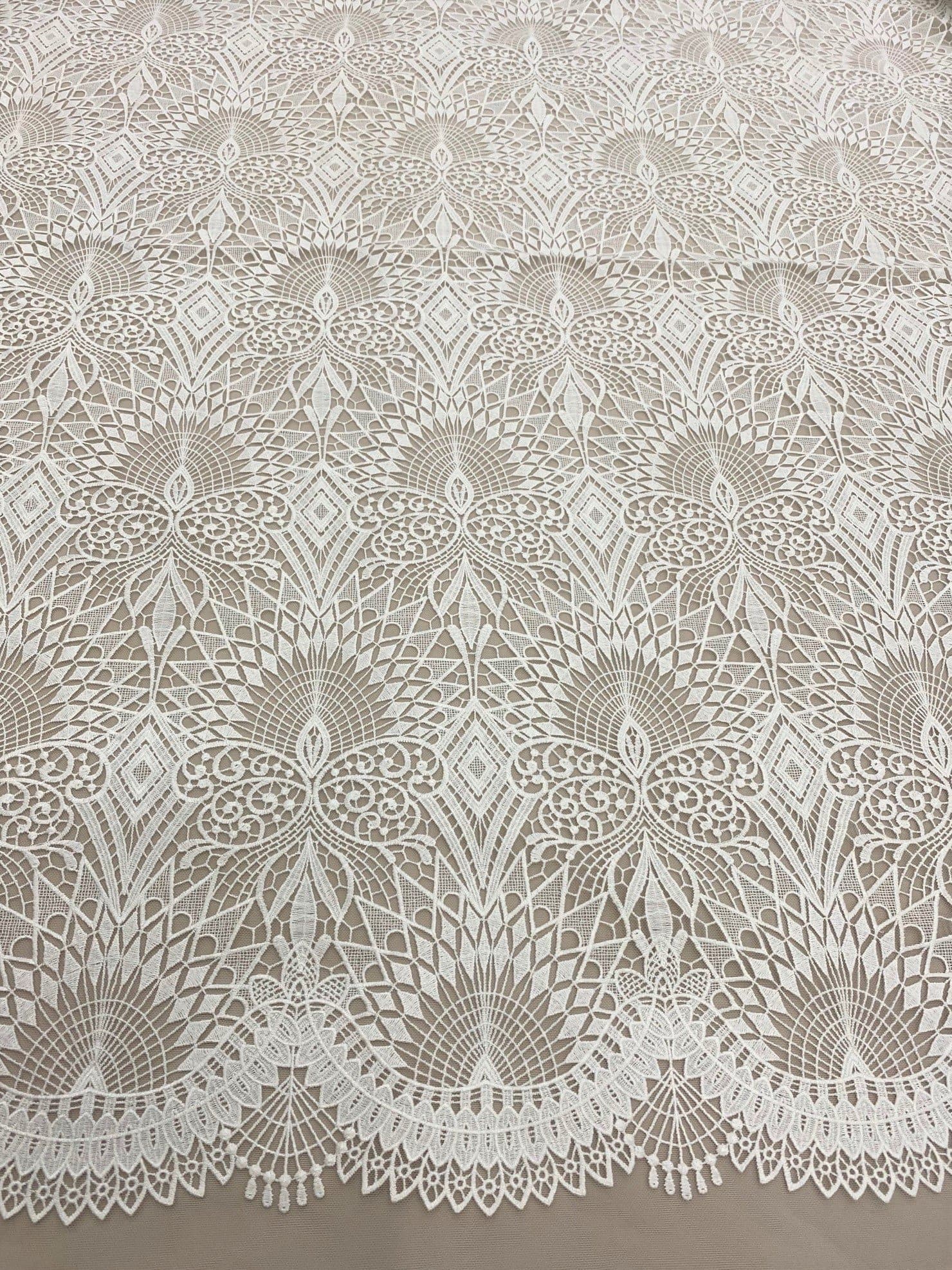 Ivory Embroidered Ornamental Tulle — featuring art deco motifs, 60% nylon 40% polyester, 130cm wide