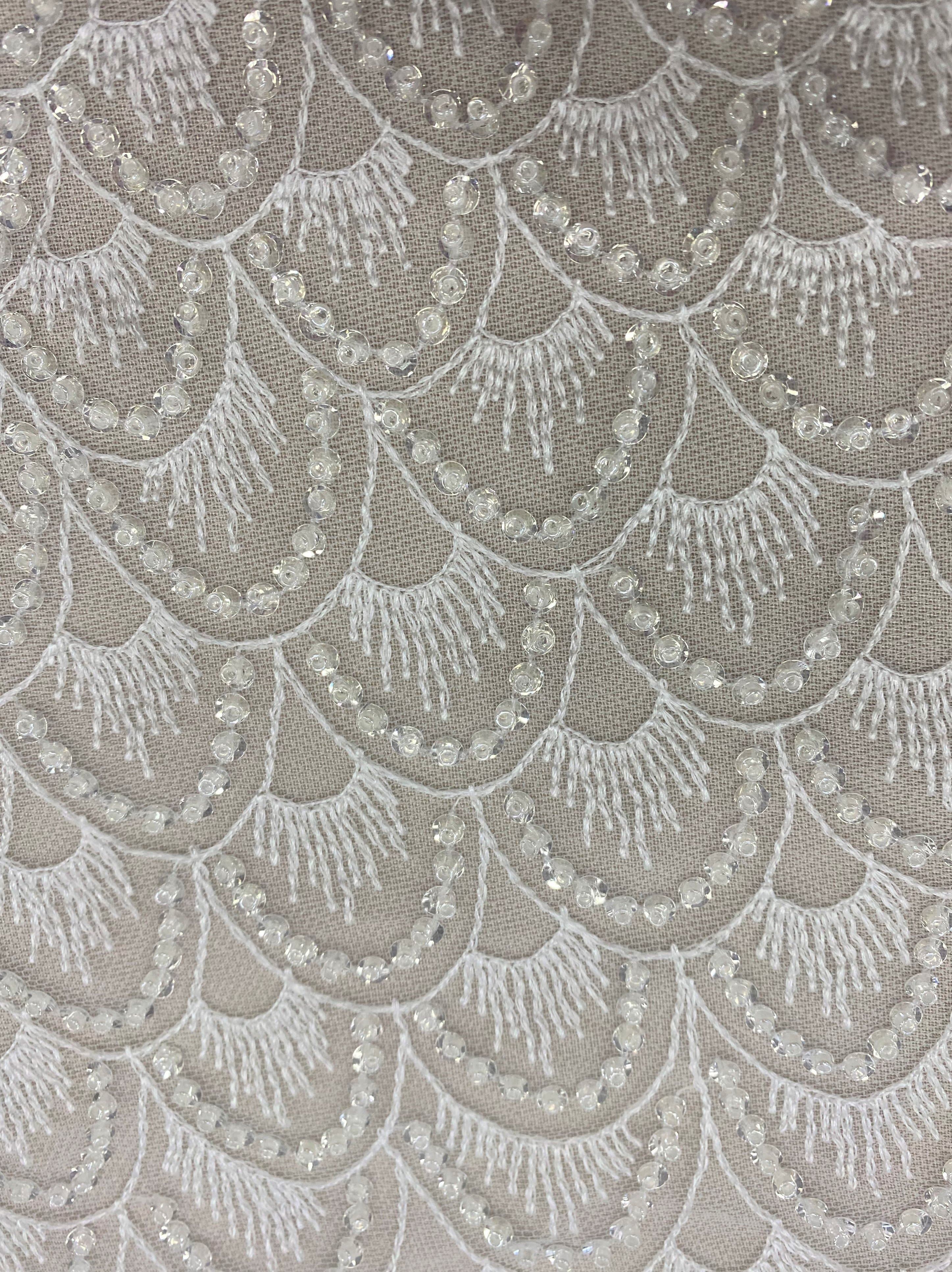Ivory Embellished Tulle — featuring hand-beading and sequins, 60% nylon 40% polyester, 130cm wide