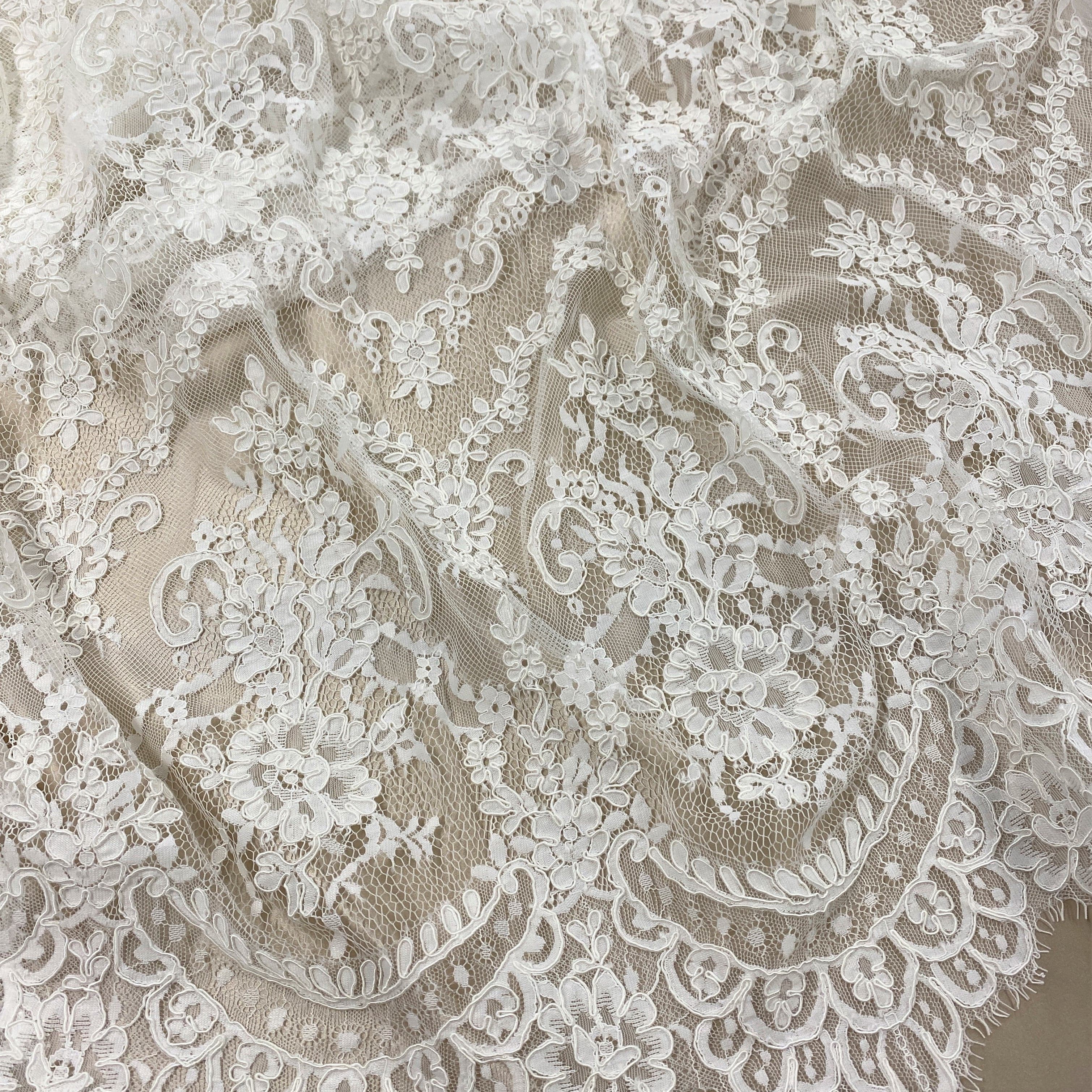Ivory Abloom Corded Lace — featuring scalloped edges, floral motifs and a corded texture, in nylon and viscose, 130cm wide