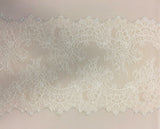 Mid Ivory Fine Lace Trim — featuring scalloped edges, eyelash detail and floral motifs, in nylon, 30cm wide