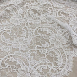 Ivory Floral Corded Lace — featuring scalloped edges, floral motifs and a corded texture, in nylon and viscose, 130cm wide