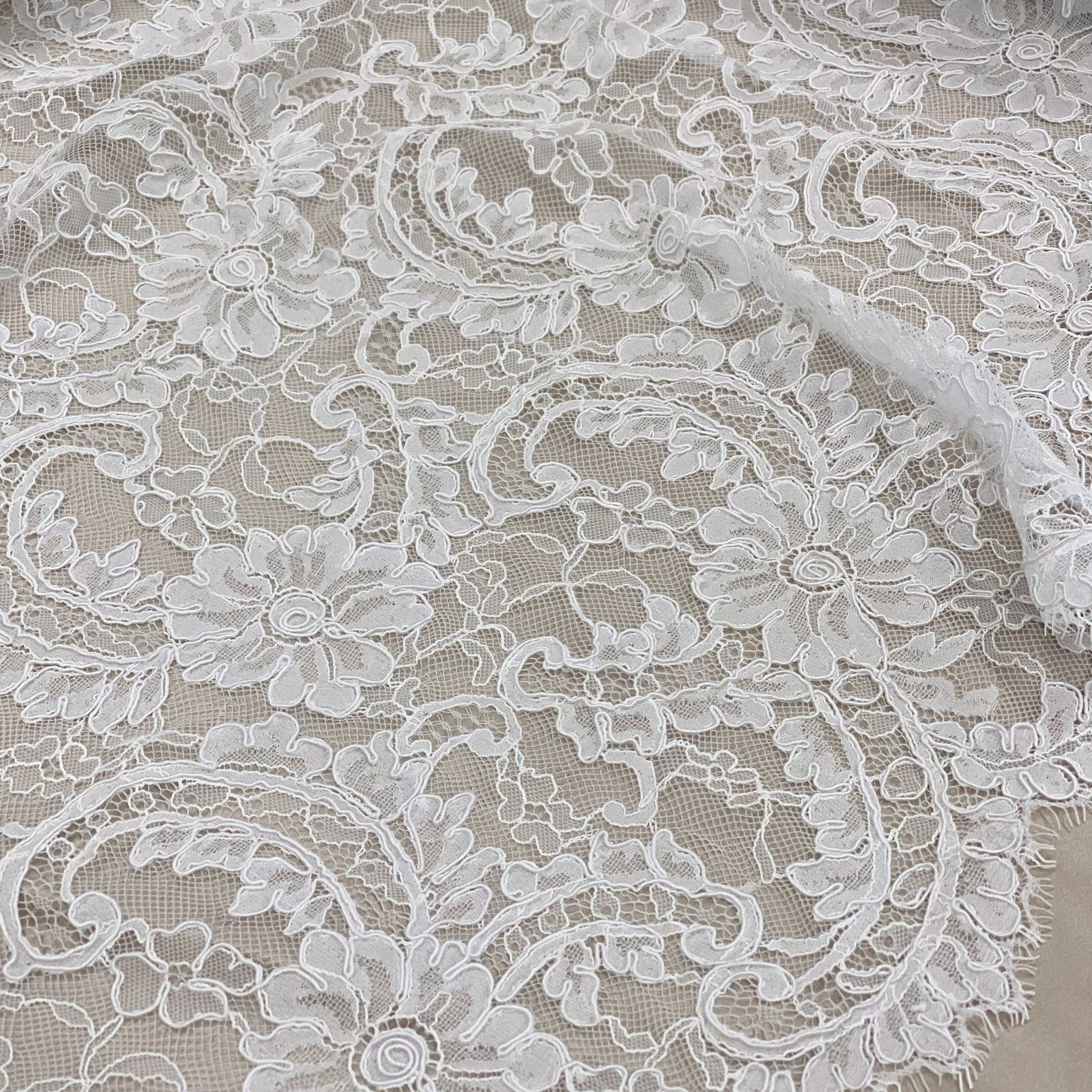 Ivory Floral Corded Lace — featuring scalloped edges, floral motifs and a corded texture, in nylon and viscose, 130cm wide
