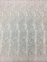 Ivory Embroidered Lace — featuring scalloped edges, eyelash detail and floral motifs, in nylon and viscose, 130cm wide