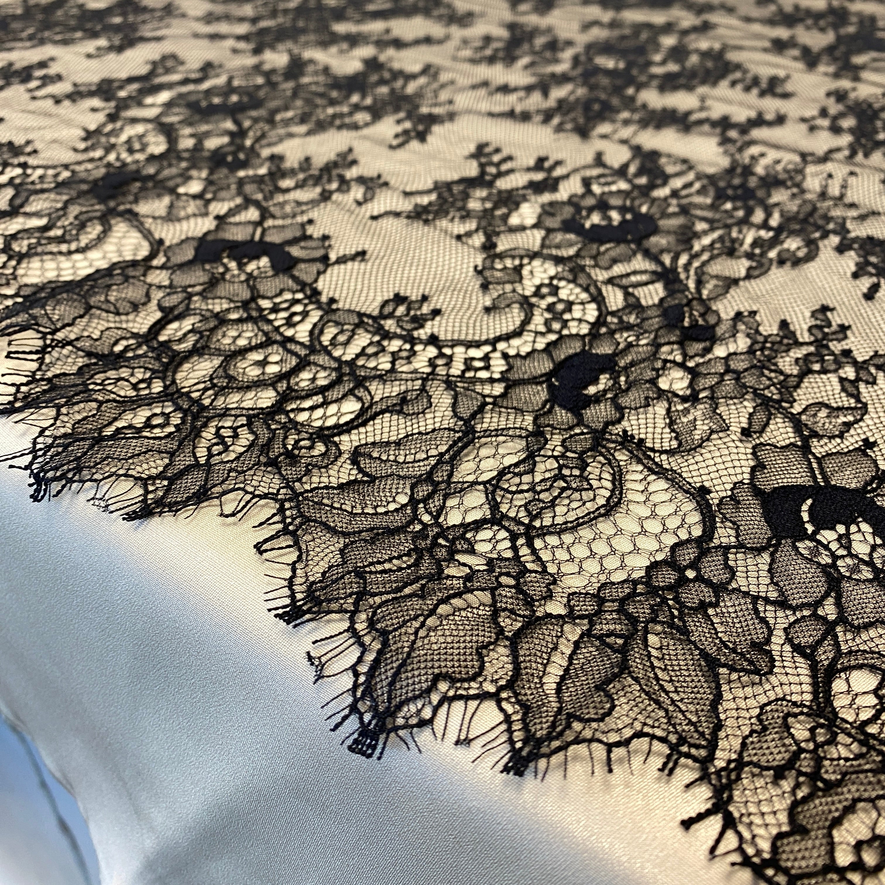 Black Fine Floral Lace — featuring scalloped edges, eyelash detail and floral motifs, 150cm wide