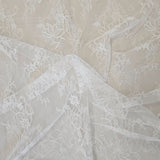 Ivory Fine Floral Lace — featuring scalloped edges, eyelash detail and floral motifs, in nylon, 130cm wide