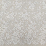 Ivory Fine Floral Lace — featuring scalloped edges and floral motifs, 130cm wide