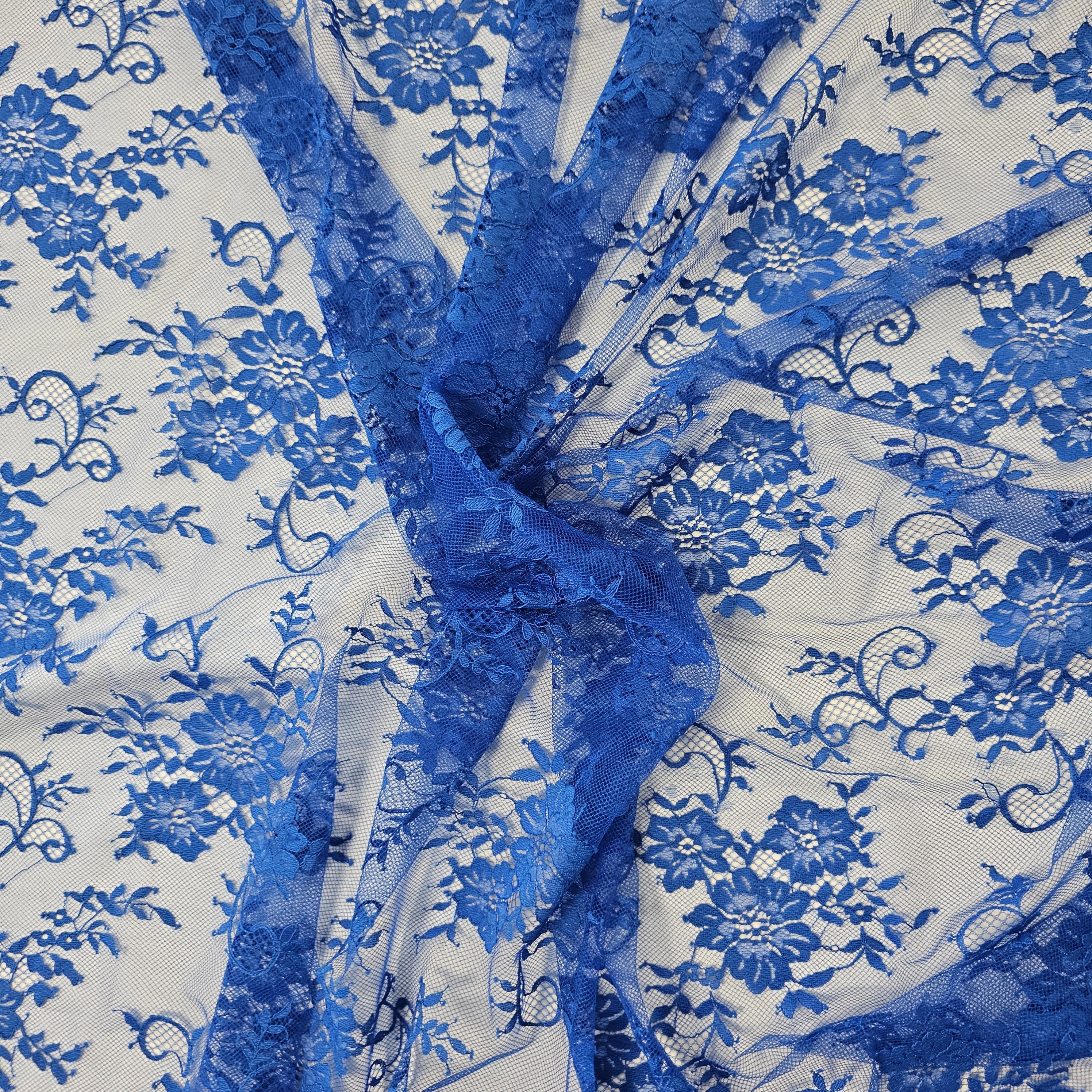 Marine Fine Floral Lace — featuring scalloped edges and floral motifs, 130cm wide