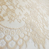 Nude Fine Floral Lace — featuring scalloped edges and floral motifs, 130cm wide