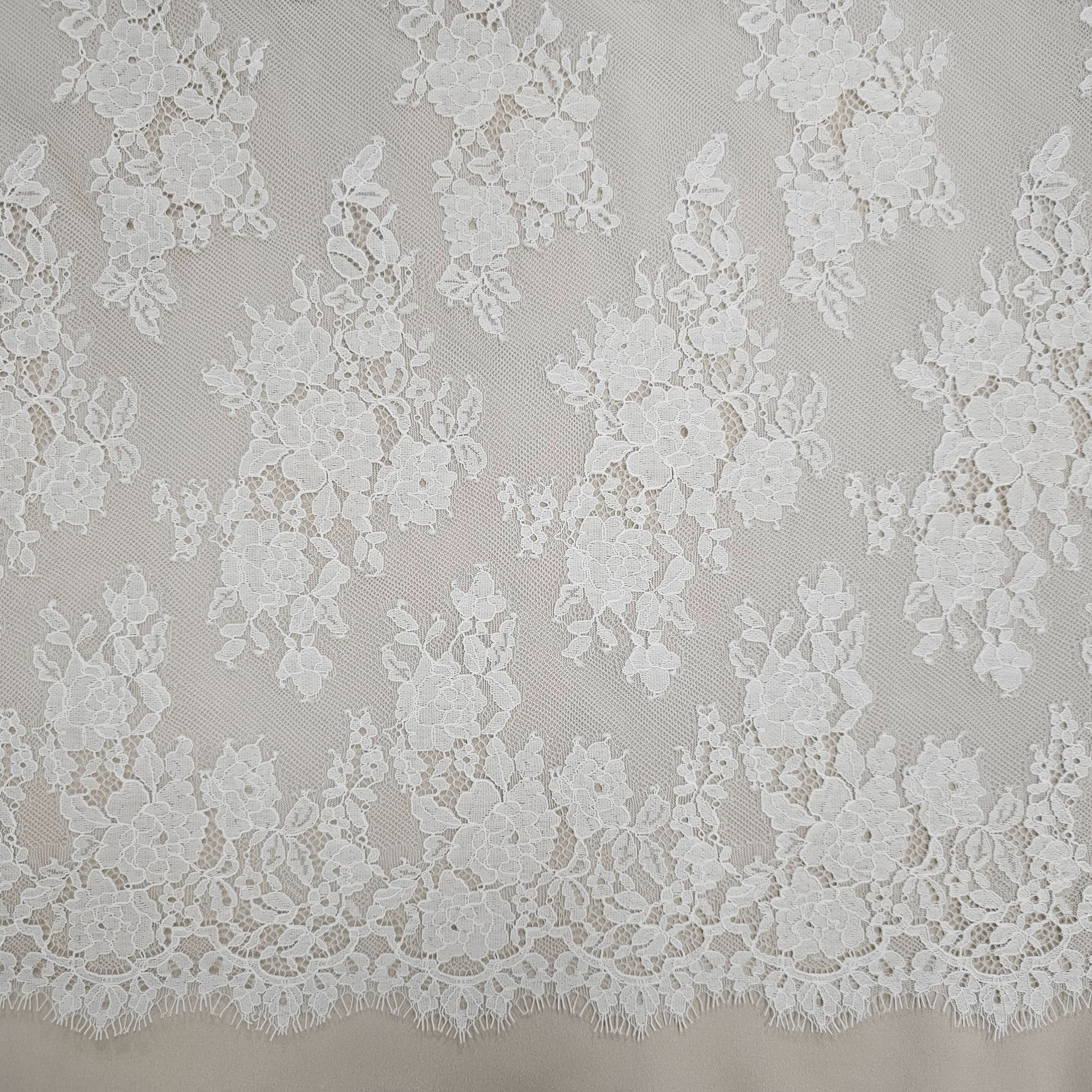 Ivory Fine Floral Lace — featuring scalloped edges, eyelash detail and floral motifs, in nylon and cotton, 150cm wide