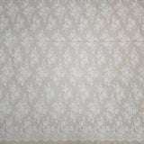 Ivory Fine Floral Lace — featuring scalloped edges, eyelash detail and floral motifs, in nylon and cotton, 150cm wide