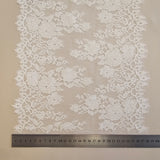 Ivory Fine Lace Trim — featuring scalloped edges, eyelash detail and floral motifs, in cotton and nylon, 30cm wide