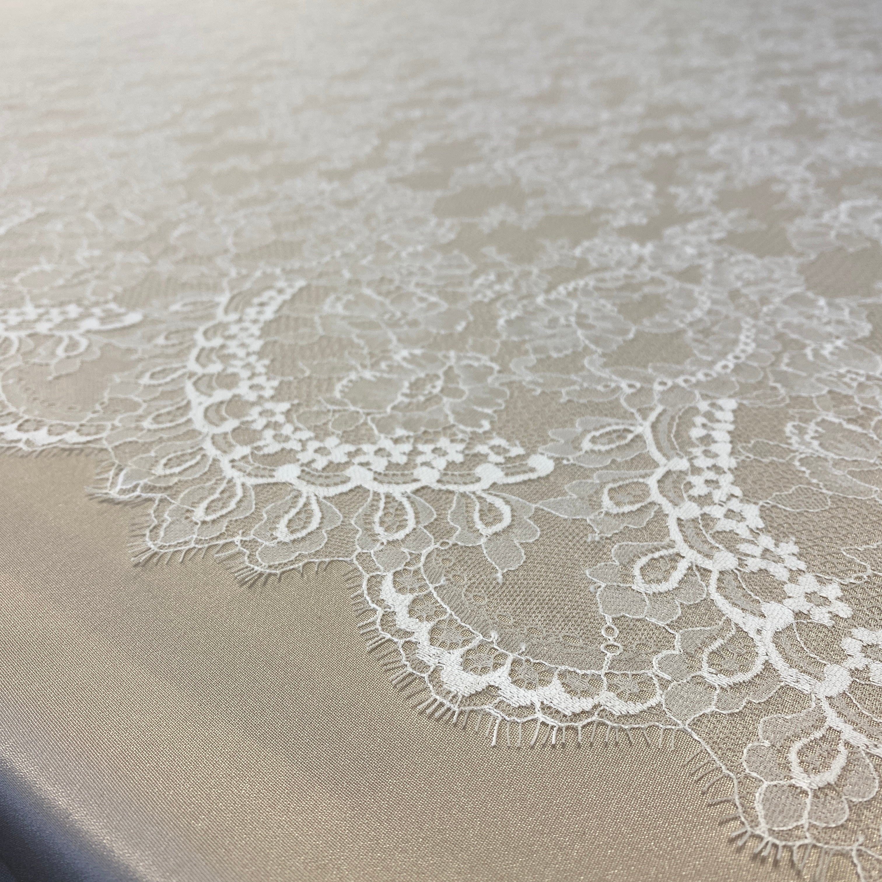 Ivory Floral Lace — featuring scalloped edges, eyelash detail and floral motifs, in nylon, 150cm wide
