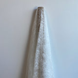 Ivory Floral Lace — featuring scalloped edges, eyelash detail and floral motifs, in nylon, 150cm wide