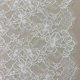 Ivory Glitter Floral Lace — featuring scalloped edges and floral motifs, in nylon, 140cm wide