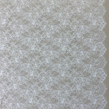 Ivory Glitter Floral Lace — featuring scalloped edges and floral motifs, in nylon, 140cm wide