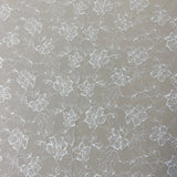 Ivory Floral Lace — featuring scalloped edges, eyelash detail and floral motifs, in nylon, 140cm wide