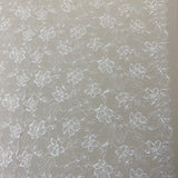 Ivory Floral Lace — featuring scalloped edges, eyelash detail and floral motifs, in nylon, 140cm wide