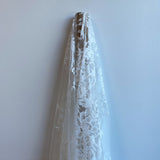 Ivory Floral Lace — featuring scalloped edges, eyelash detail and floral motifs, in nylon, 150cm wide