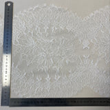 Ivory Fine lace trim — featuring scalloped edges, eyelash detail and floral motifs, 30cm wide