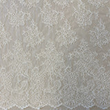 Ivory Fine Corded Lace — featuring scalloped edges, floral motifs and a corded texture, in nylon, cotton and viscose, 140cm wide