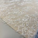 Ivory Beaded Fine Lace — featuring scalloped edges, eyelash detail and floral motifs, in nylon, 150cm wide