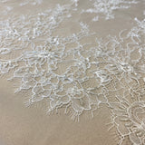 Ivory Beaded Fine Lace — featuring scalloped edges, eyelash detail and floral motifs, in nylon, 150cm wide