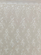 Ivory Beaded Fine Lace — featuring scalloped edges, eyelash detail and floral motifs, in nylon, 150cm wide