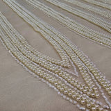 Ivory Beaded Tulle — featuring hand-beading, 100% polyamide, 140cm wide