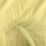 Pastel Yellow Polyester Dupion — mid-weight and crisp with a lightly slubbed texture, 100% polyester, 140cm wide