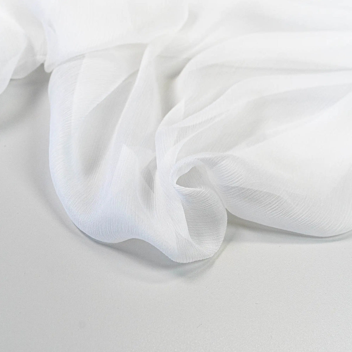 White Crinkle Chiffon — a lightweight, sheer silk chiffon with a crinkled texture, 100% silk, 137cm wide