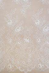 Ivory Fine Lace — featuring scalloped edges and floral motifs, 140cm wide