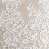 White Corded Floral Lace — featuring scalloped edges, eyelash detail and floral motifs, in nylon, 140cm wide