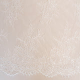 Ivory Beaded Lace — featuring scalloped edges, floral motifs and hand-beading, in nylon and viscose, 130cm wide