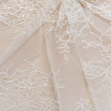 Ivory Beaded Lace — featuring scalloped edges, floral motifs and hand-beading, in nylon and viscose, 130cm wide