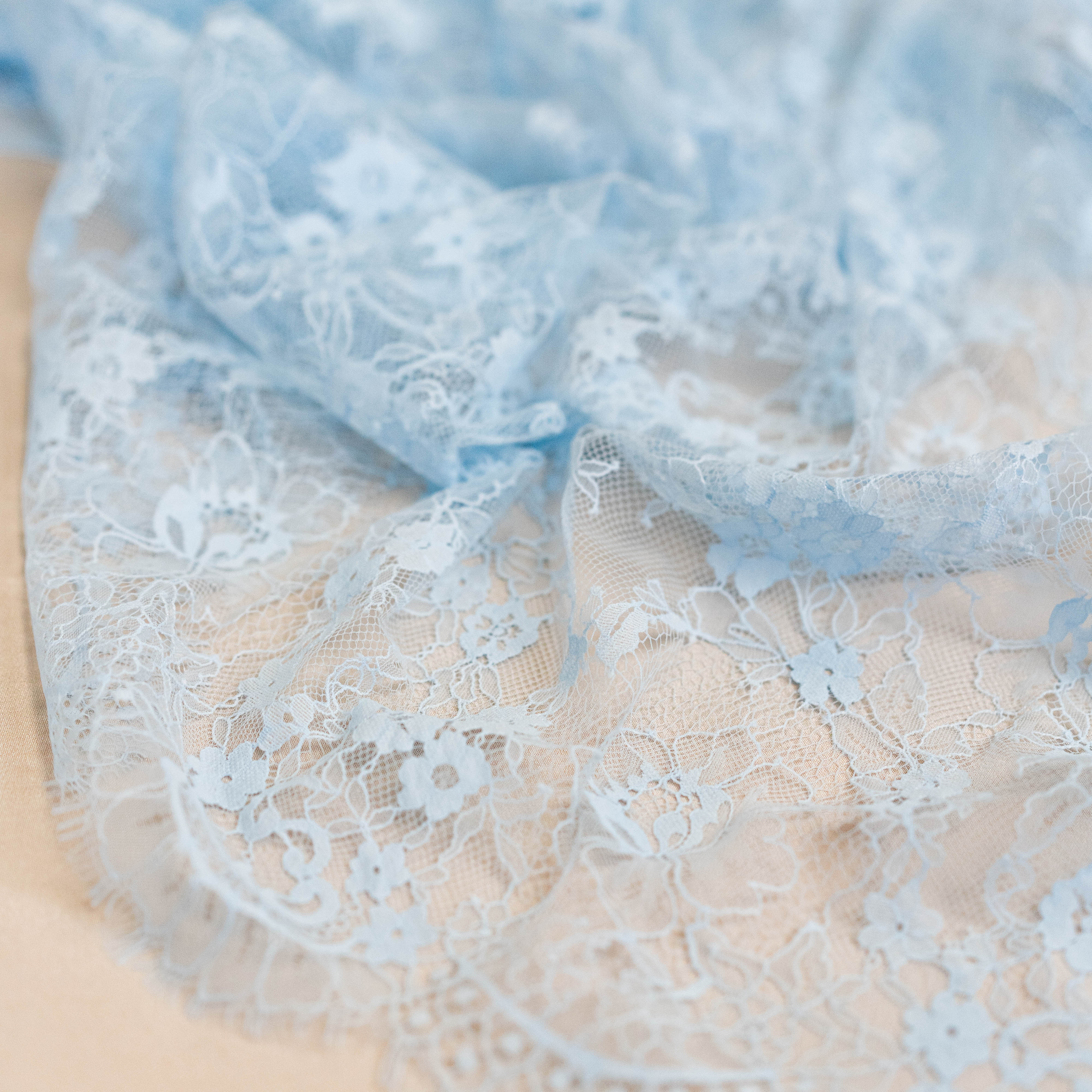Sky Blue Fine Lace — featuring scalloped edges and floral motifs, in viscose and nylon, 140cm wide