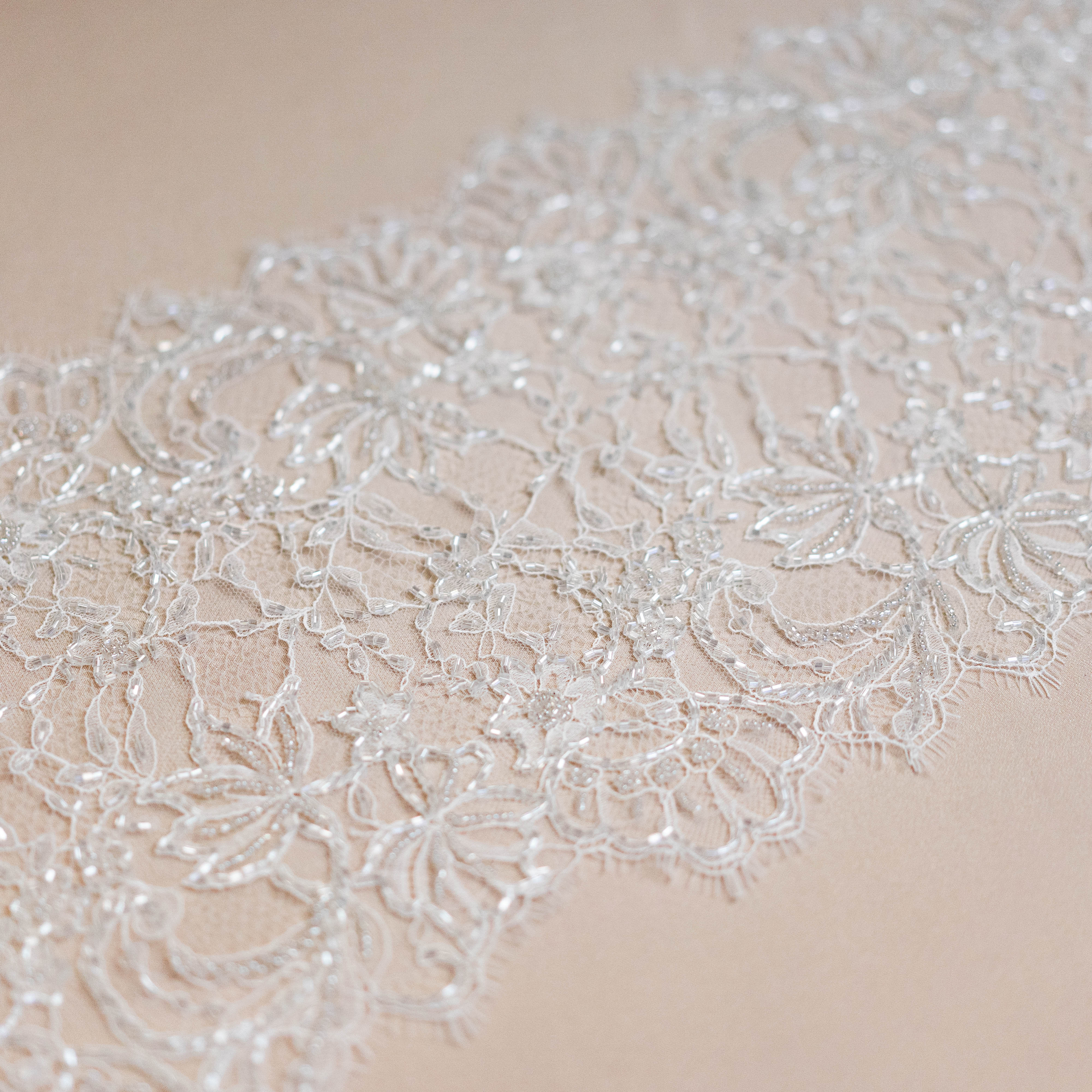 Light Ivory Floriated Beaded Lace Trim — featuring scalloped edges, eyelash detail and floral motifs, in nylon, 30cm wide