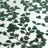 Bottle Green Botanical Beaded Tulle — featuring floral motifs, a 3D floral design and hand-beading, 50% nylon 50% polyester, 130cm wide