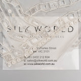 Ivory Cutwork Beaded Tulle — featuring hand-beading and sequins, 100% nylon, 140cm wide
