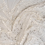 Ivory Cutwork Beaded Tulle — featuring hand-beading and sequins, 100% nylon, 140cm wide