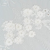 Ivory Embroidered 3D Tulle — featuring floral motifs, a 3D floral design and hand-beading, 50% nylon 50% rayon, 140cm wide