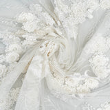 Ivory Embroidered 3D Tulle — featuring floral motifs, a 3D floral design and hand-beading, 50% nylon 50% rayon, 140cm wide