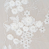 Ivory Embroidered 3D Tulle — featuring floral motifs, a 3D floral design and hand-beading, 50% nylon 50% rayon, 140cm wide