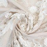 Ivory Embroidered 3D Tulle — featuring floral motifs, a 3D floral design and hand-beading, 50% nylon 50% rayon, 140cm wide