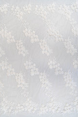 Ivory Embroidered 3D Tulle — featuring floral motifs, a 3D floral design and hand-beading, 50% nylon 50% rayon, 140cm wide