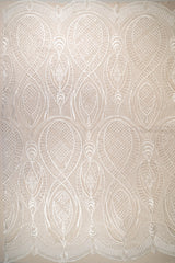 Ivory Embellished Tulle — featuring scalloped edges and hand-beading, 50% nylon 50% rayon, 130cm wide