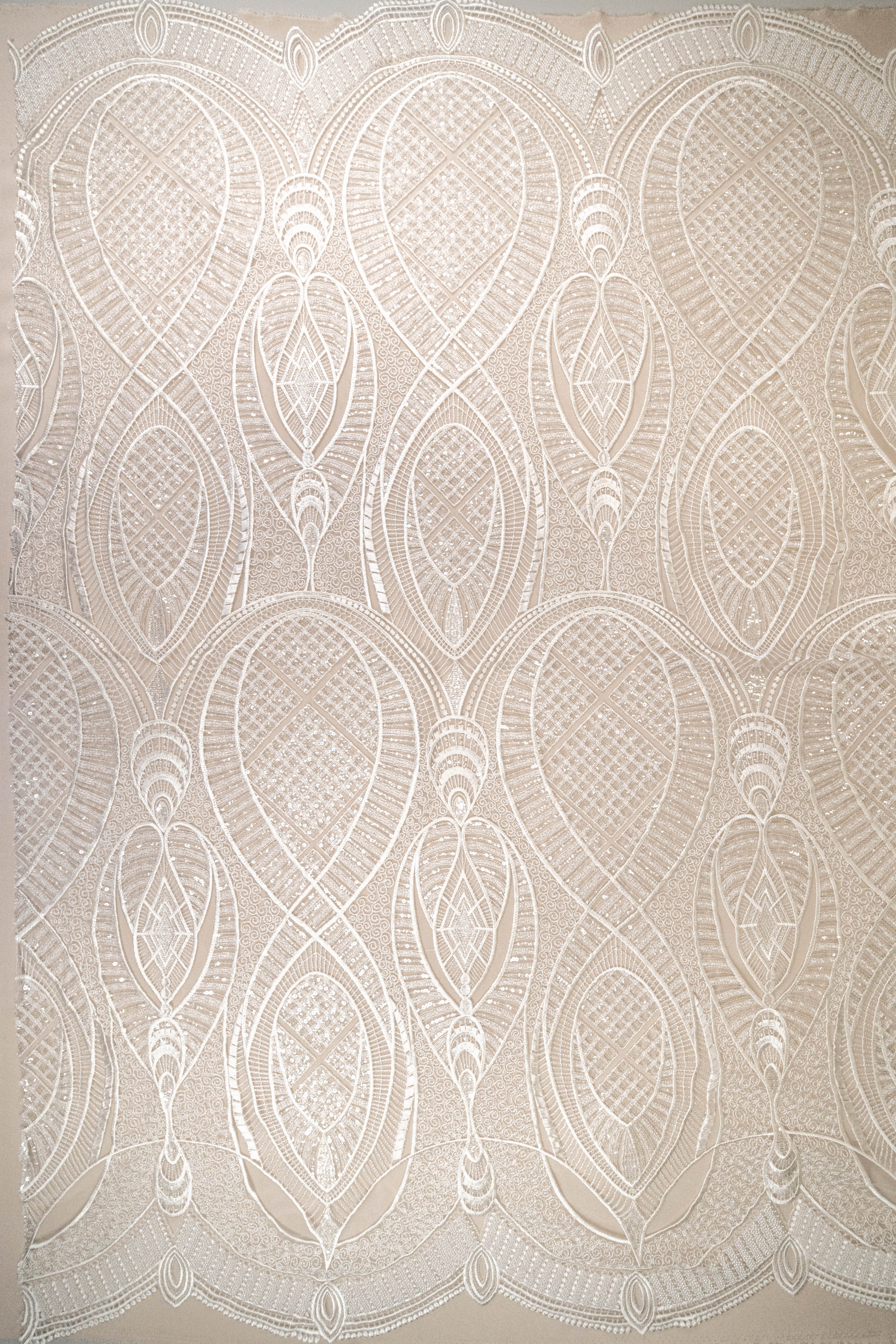 Ivory Embellished Tulle — featuring scalloped edges and hand-beading, 50% nylon 50% rayon, 130cm wide