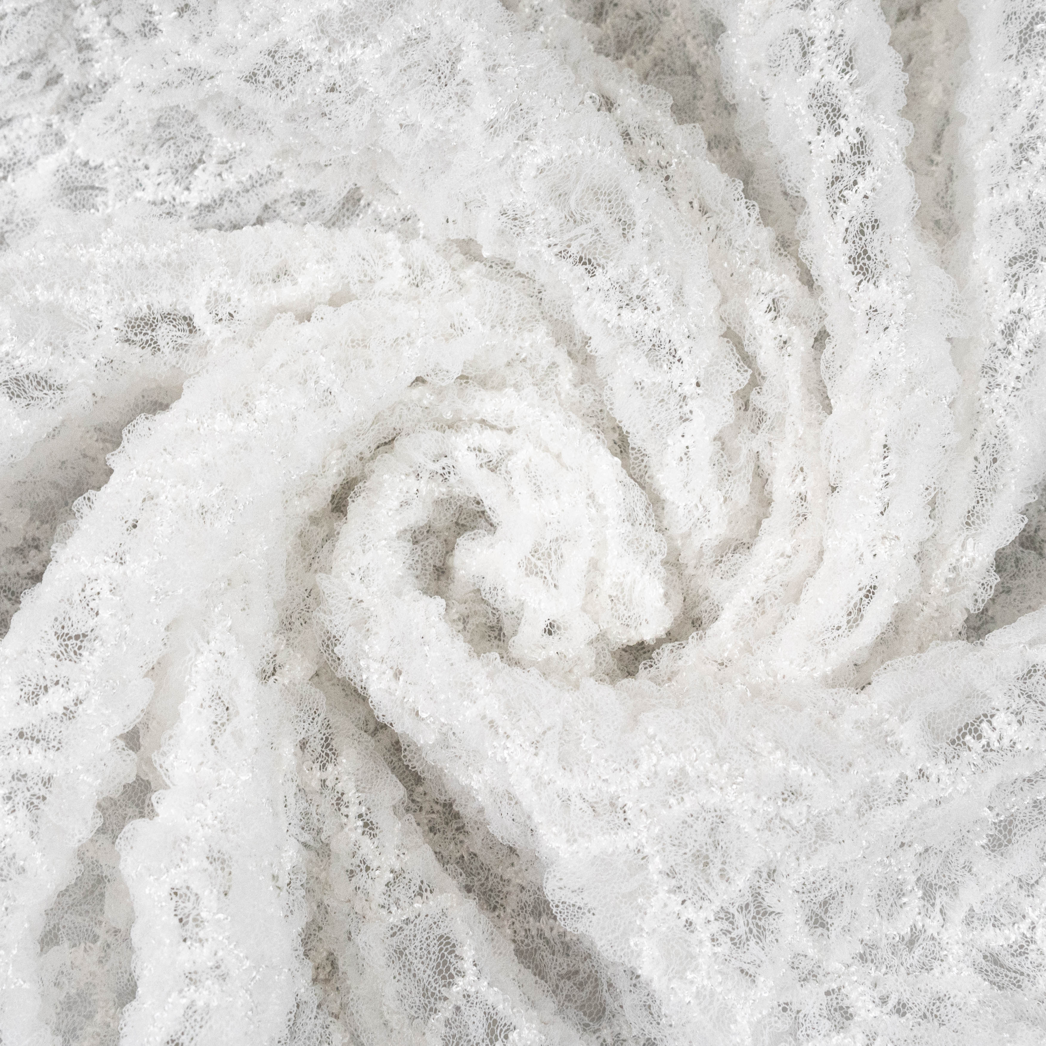 Off White Elastic Crushed Tulle — featuring a crushed texture, 100% nylon, 50cm wide