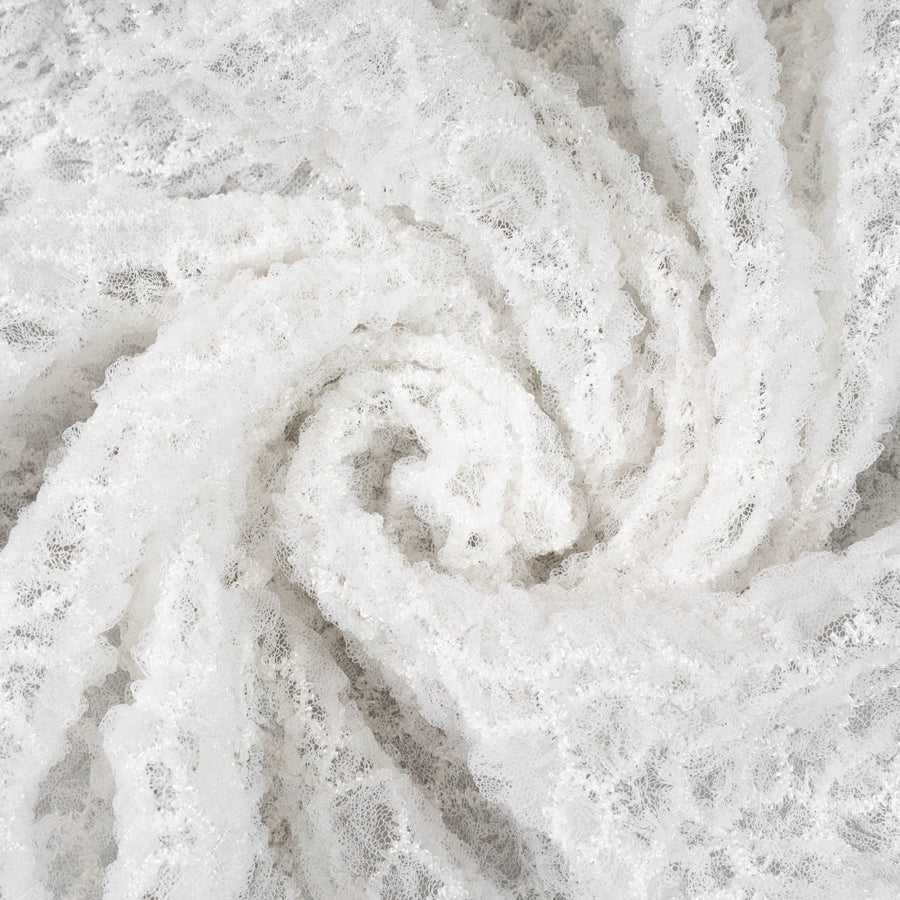 Off White Elastic Crushed Tulle — featuring a crushed texture, 100% nylon, 50cm wide